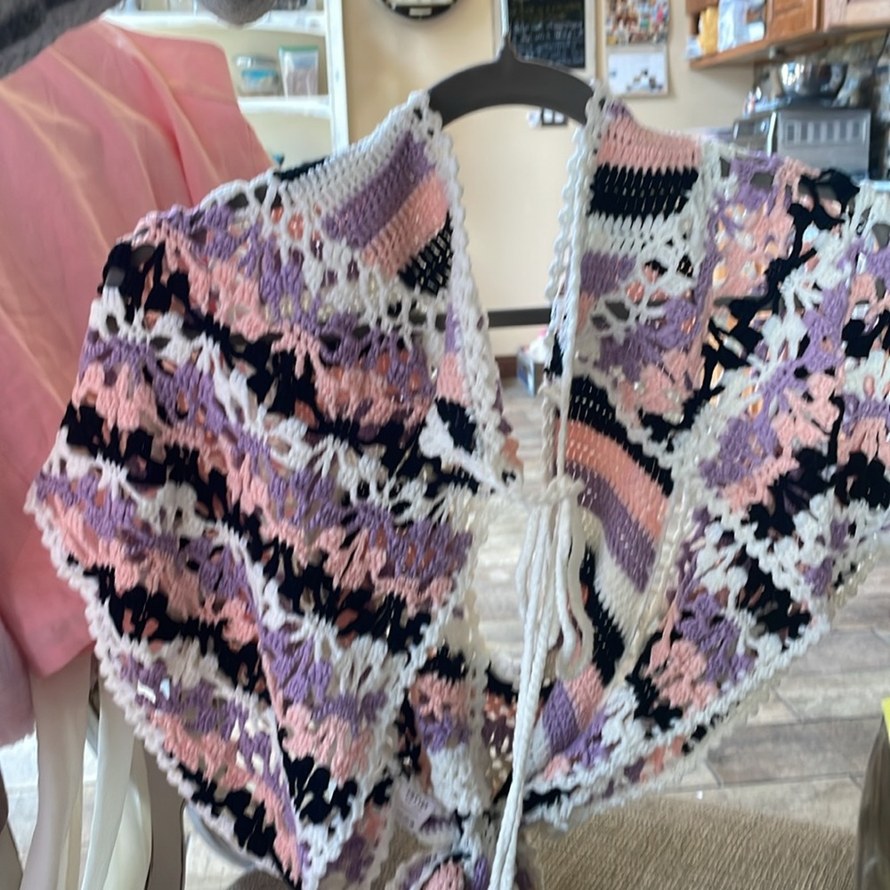 Multicolor Crochet Women's SweaterNWOT
A stunning piece . Sizes OS